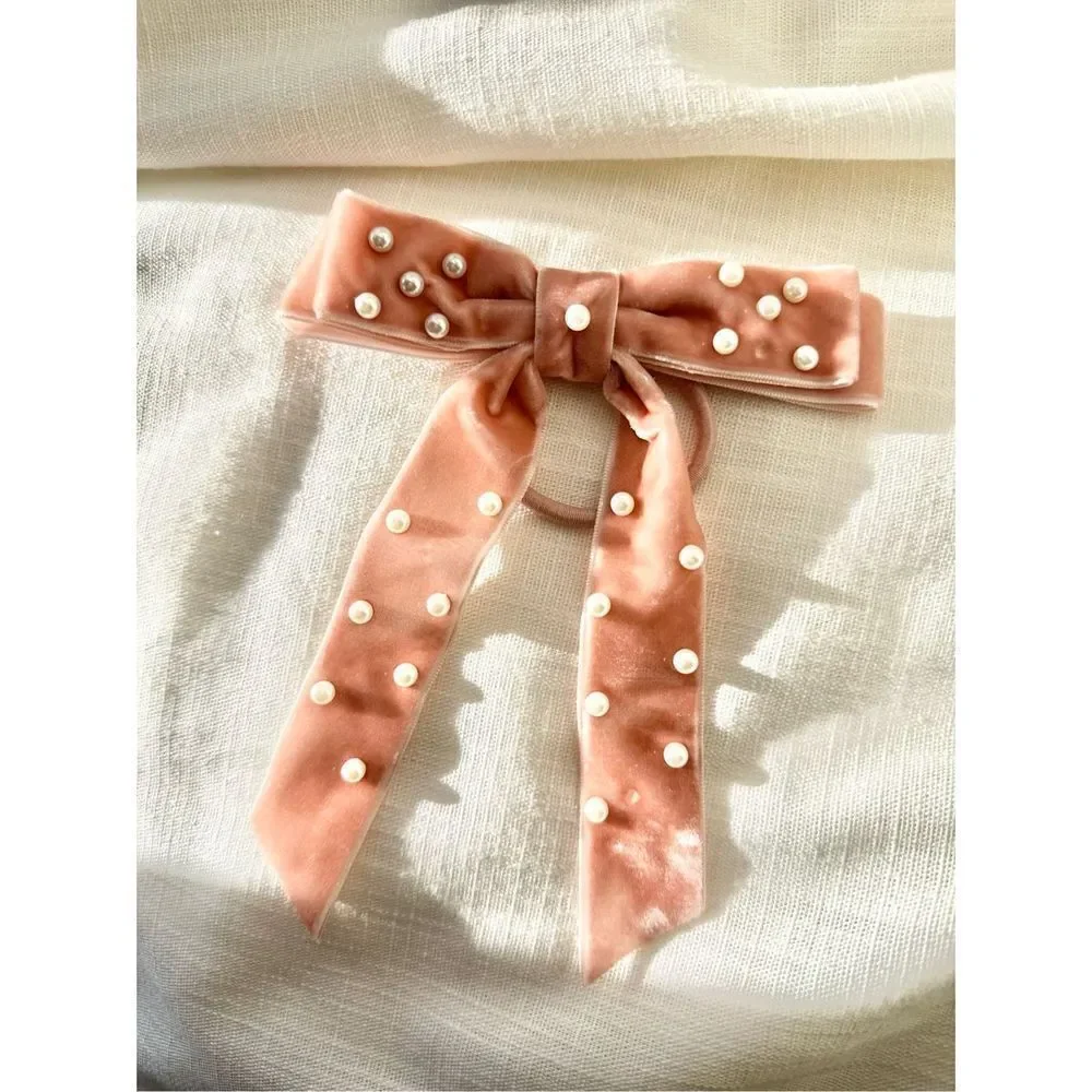 Light pink velvet bow hair tie with pearl embellishment